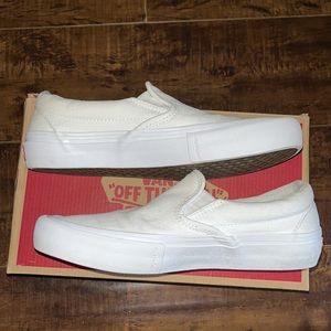 White slip on Vans